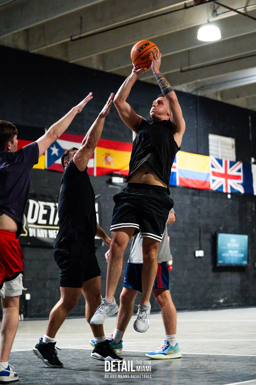 Contested shot at the rim during a private group hire