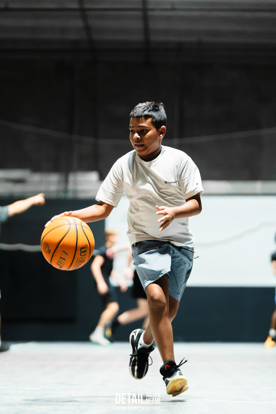 Youth athlete working a two-ball handle at DETAIL Miami